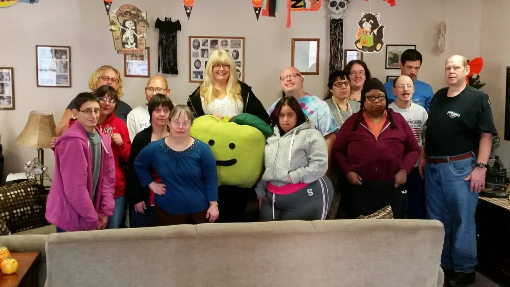Our friends at Bells Socialization Services pose with Archie the apple.